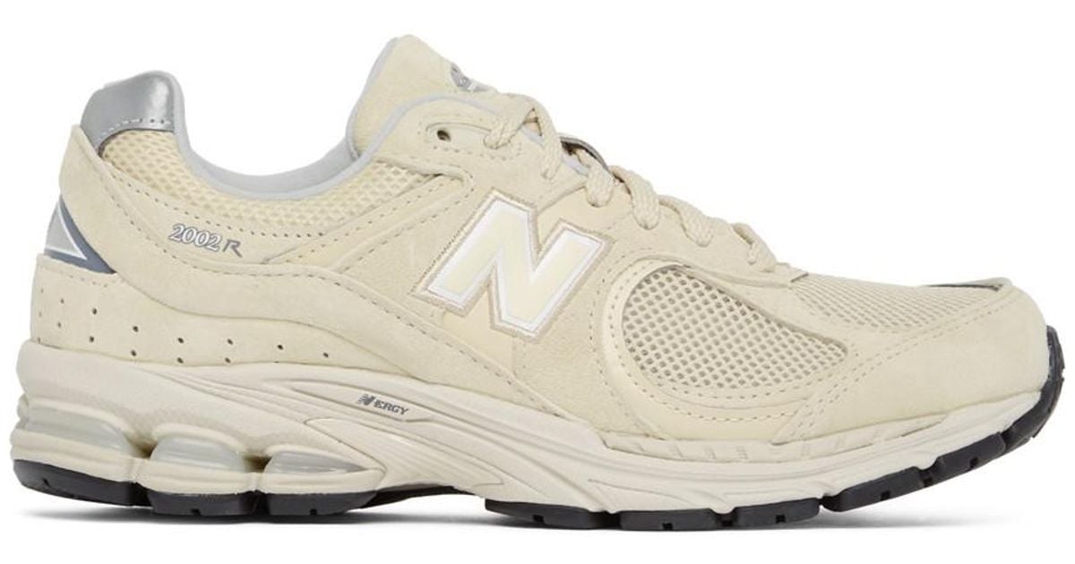 beige new balance sneakers