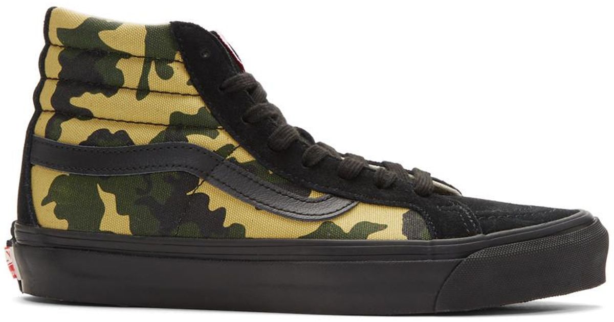 camo hi top vans