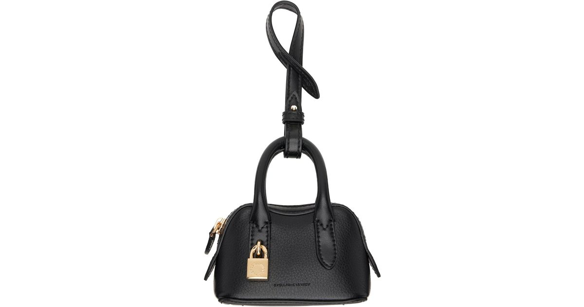 Stella McCartney Stella Ryder Charm Embossed Keychain in Black | Lyst
