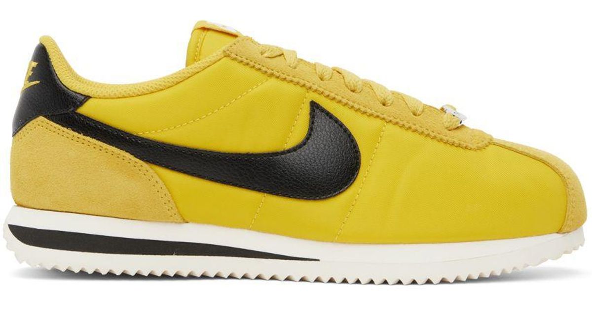 nike cortez black yellow