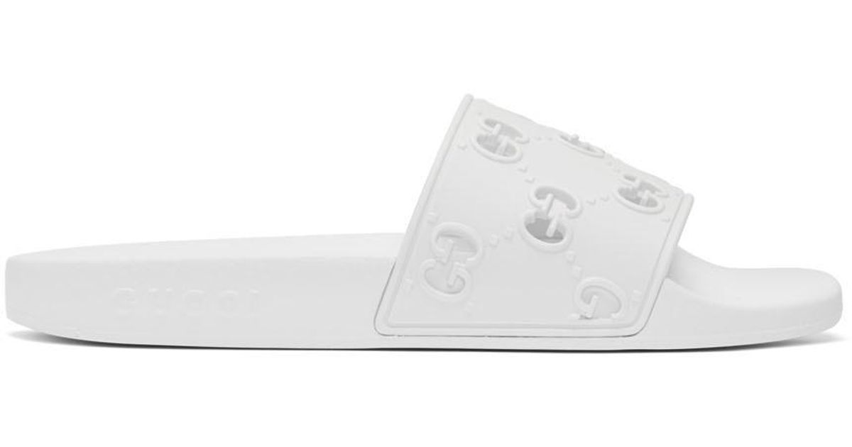 white gucci pool slides