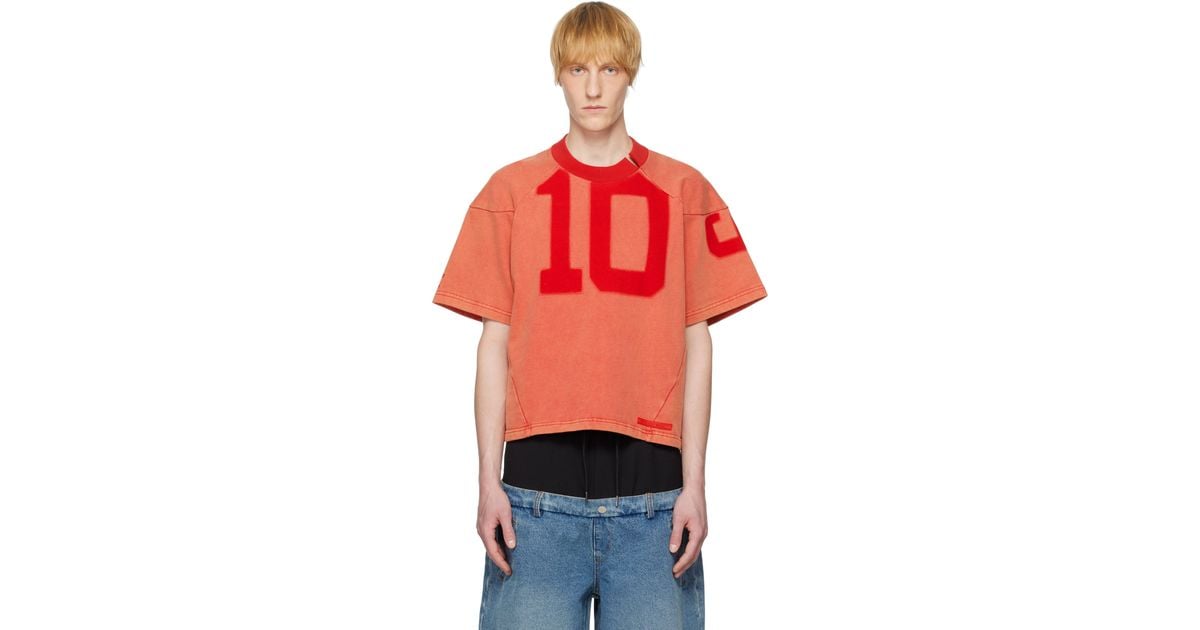 【関税込み】Spencer Badu レッド Washed ジャージ Tシャツ Red Washed Jersey T-shirt by SPENCER BADU on Sale