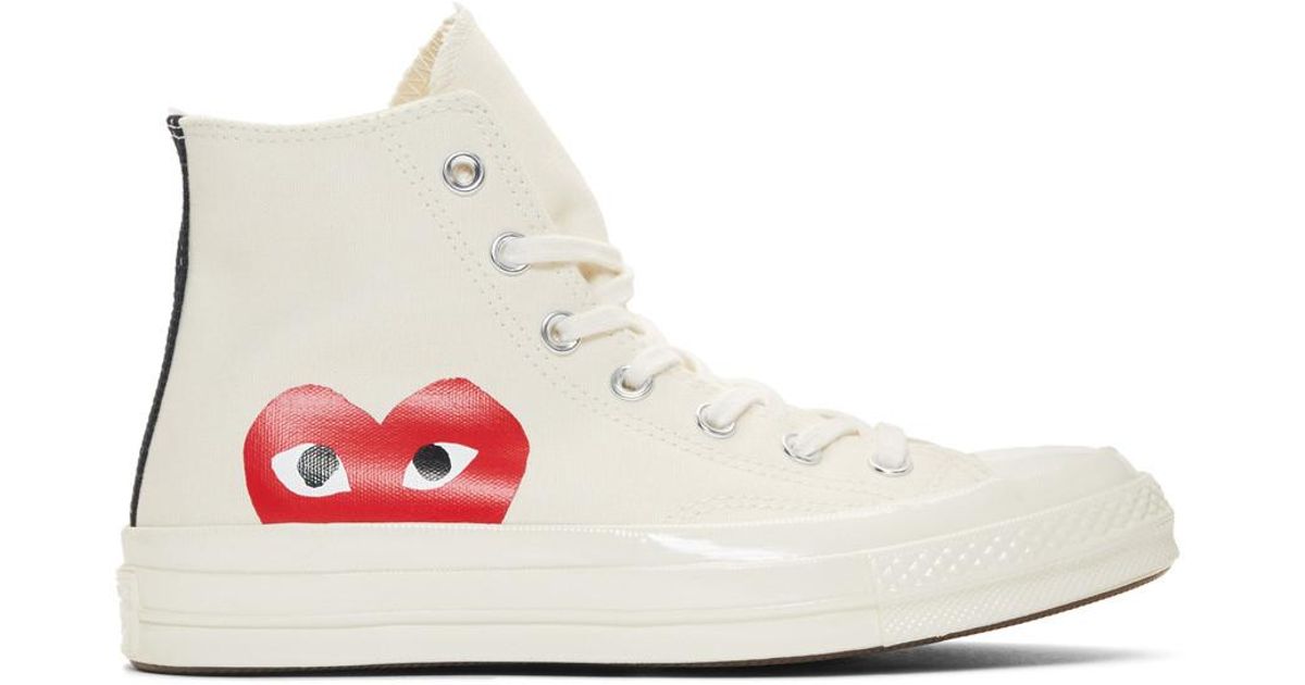 white converse with heart