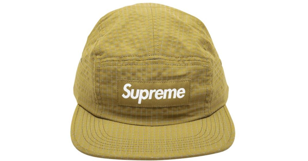 gold supreme hat