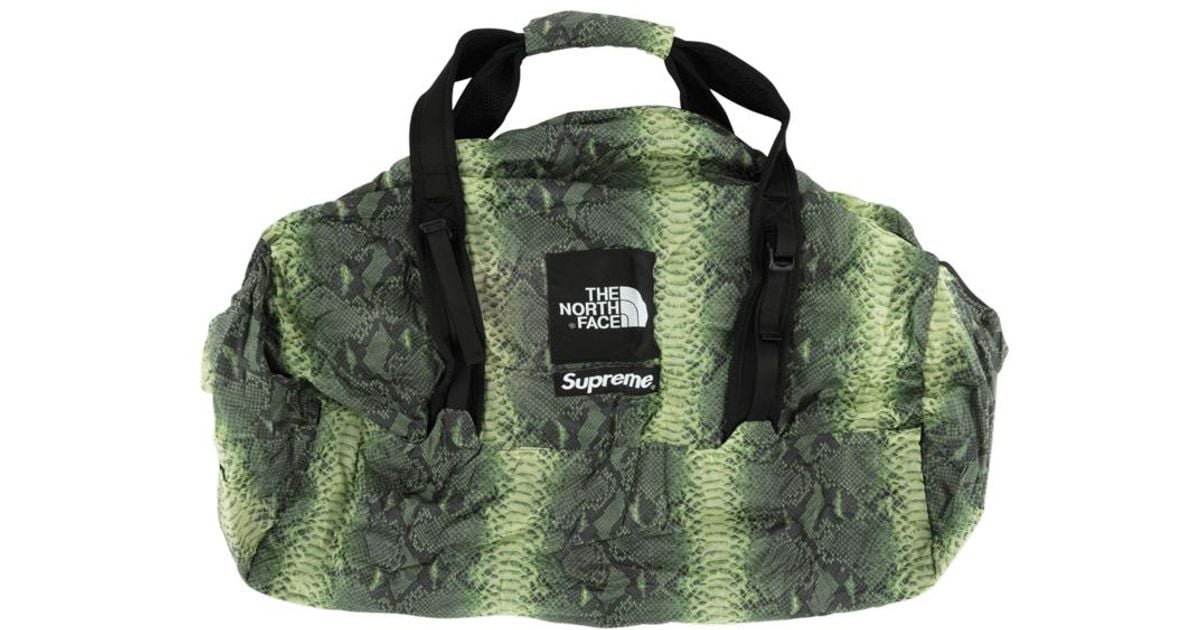supreme north face snakeskin duffle bag