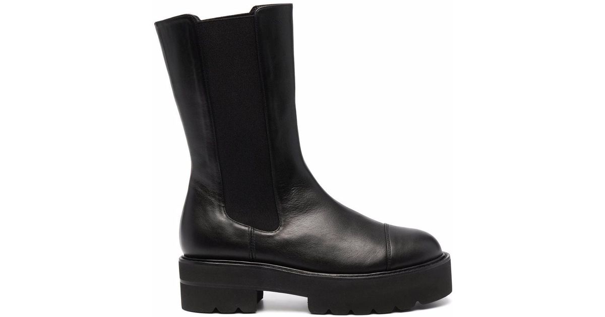 stuart weitzman tyler ultralift leather lug boots