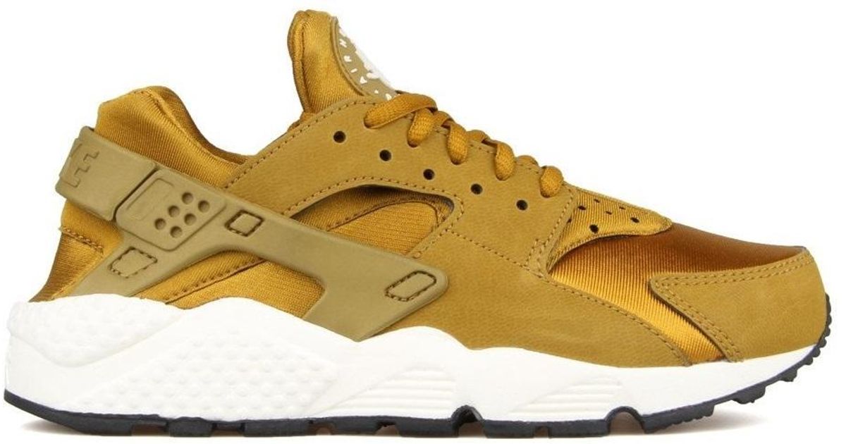 nike huarache bronzine