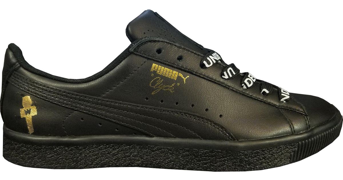 black leather pumas