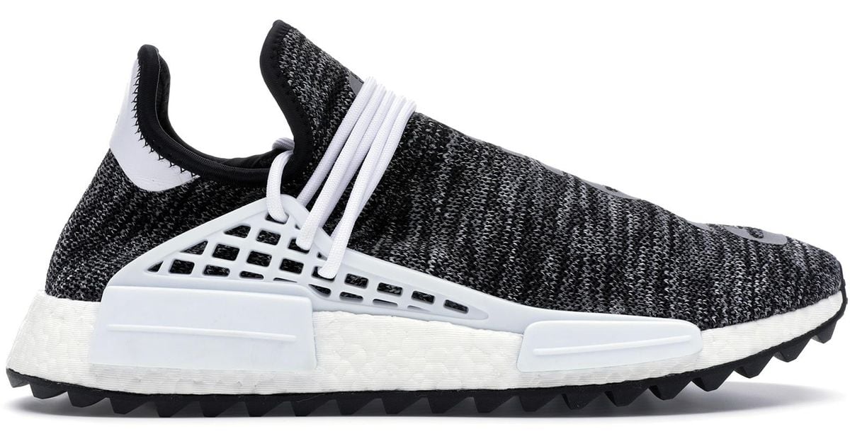 human race sneakers black and white
