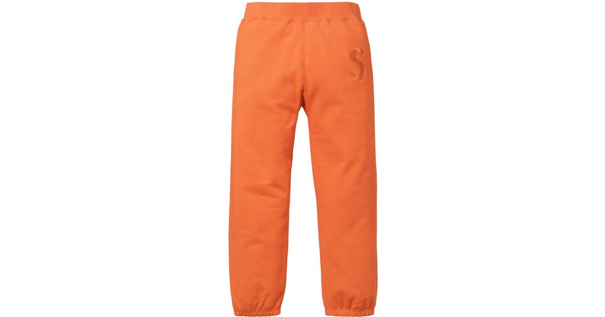 bright orange sweatpants