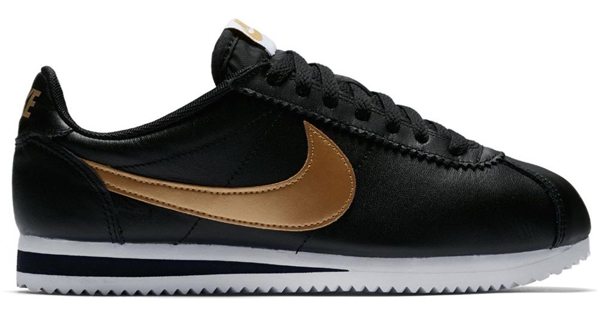nike cortez womens black and gold