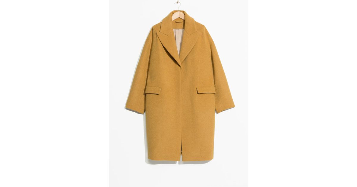 yellow oversized coat