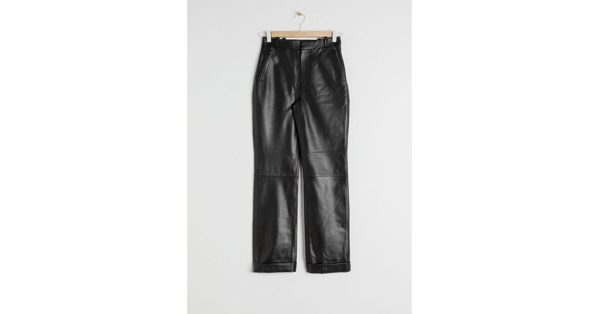 leather cuffed trousers