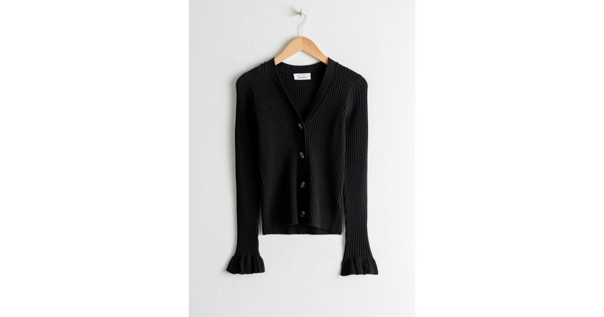 black frilly cardigan