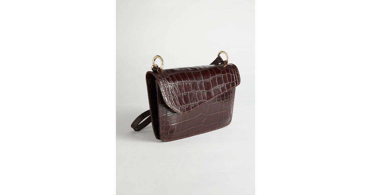 asymmetric front flap bag