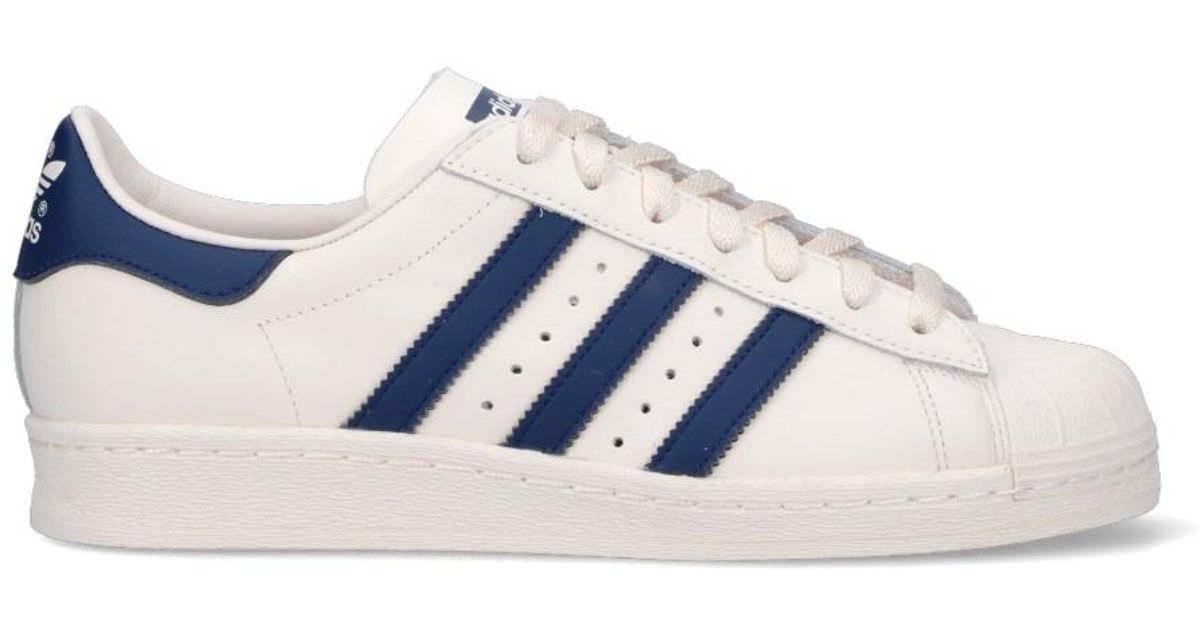 blue adidas all stars