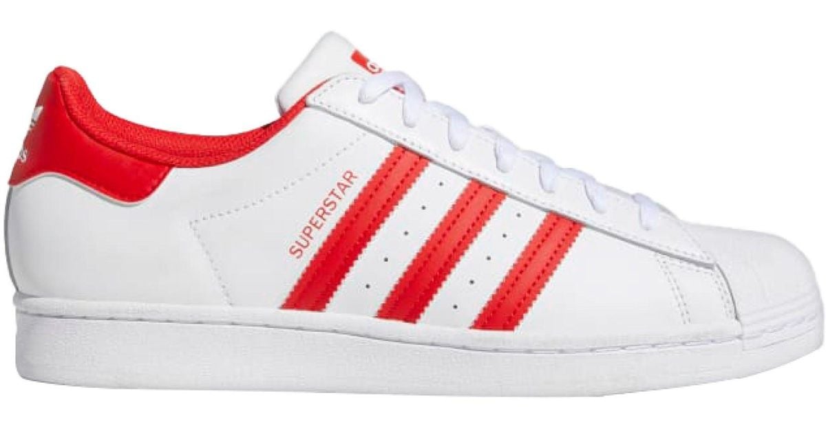 adidas superstar black with white stripes