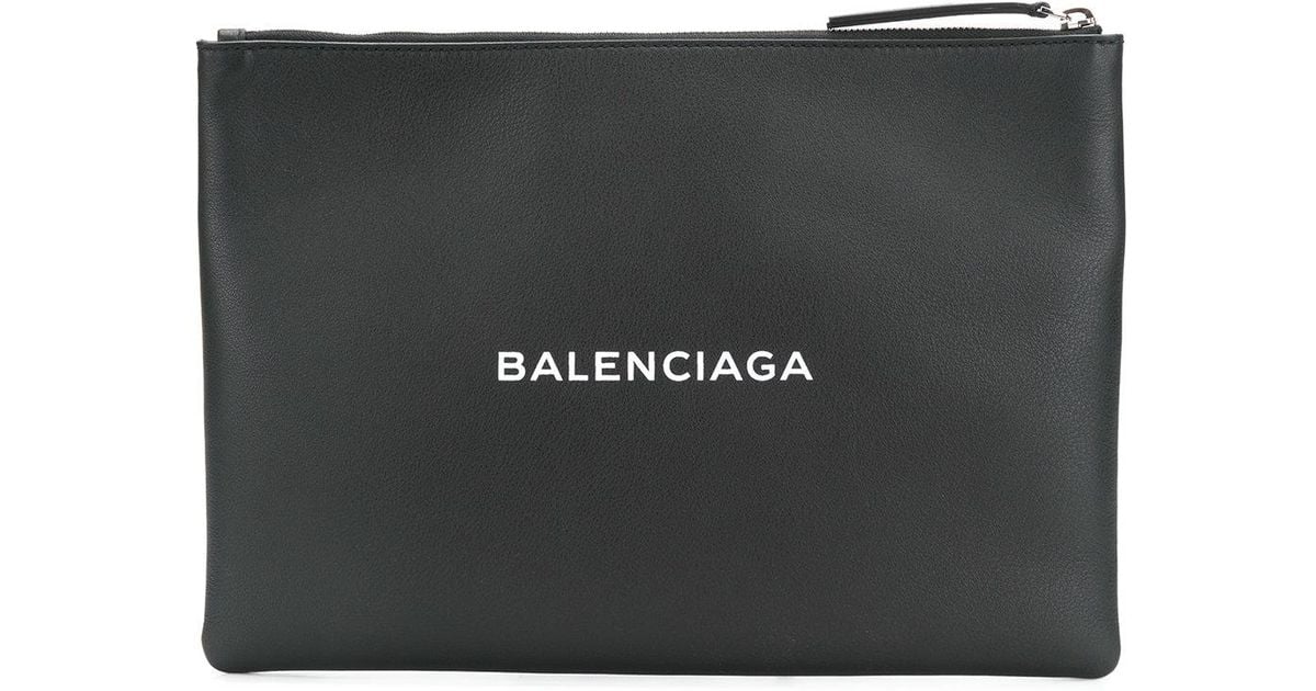 Balenciaga Logo Print Leather Clutch in 