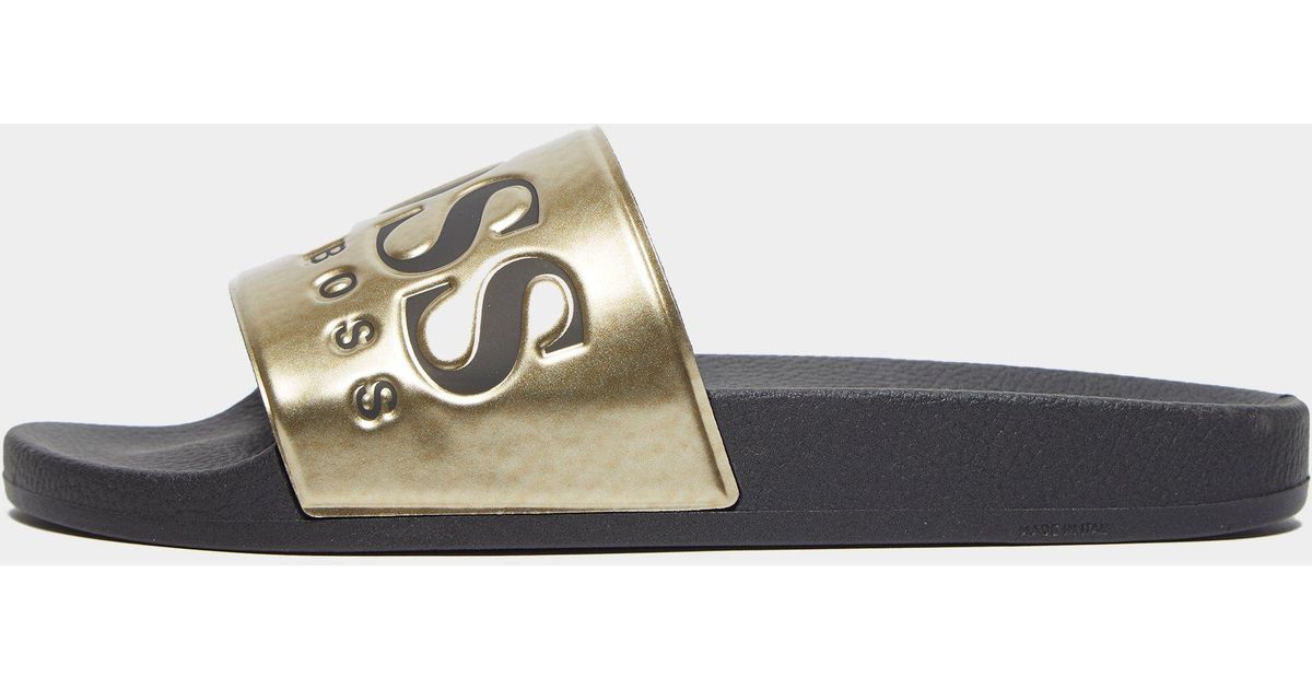 gold hugo boss sliders