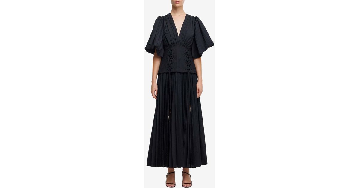acler seabrook maxi dress Seen in Acler. @juliacomil styles the 'Hertfordshire Maxi Dress' in Black. A sculptural interplay of texture and silhouette fluid, defined, and made for modern event dressing. Shop her