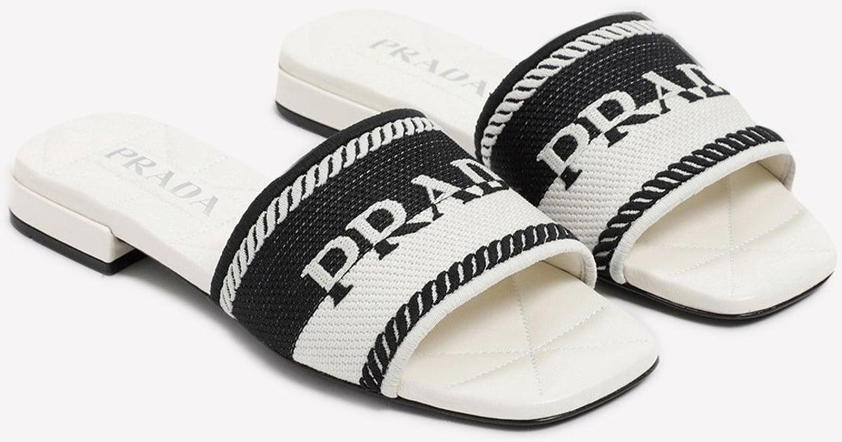 Prada Leather Logo Flat Sandals in White - Lyst