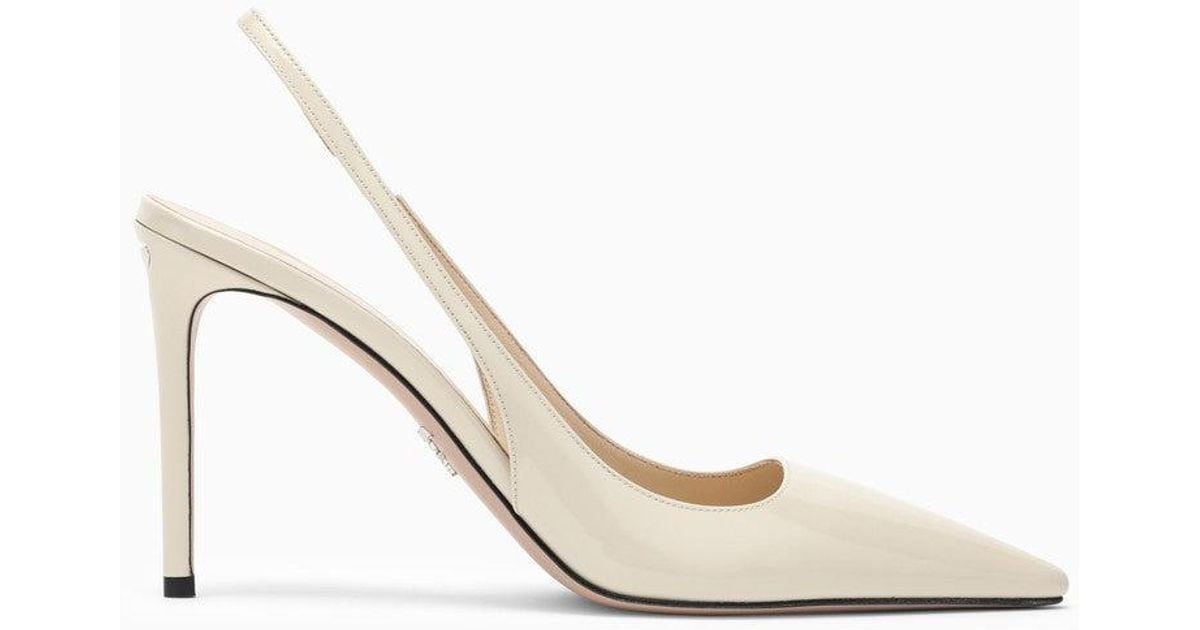 Prada Pointed Ivory Patent Leather Slingback Pumps Grey in White