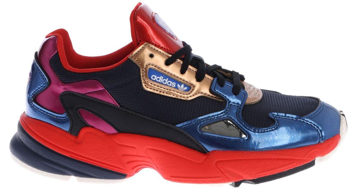 adidas shoes with red soles