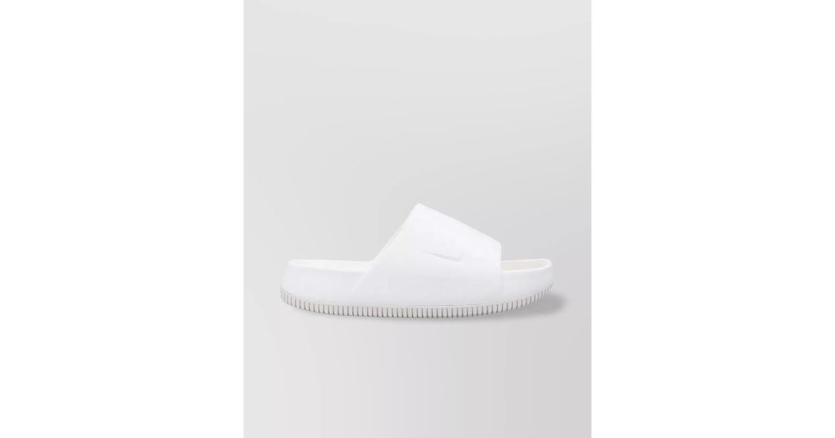 Nike Textured Slides in White | Lyst