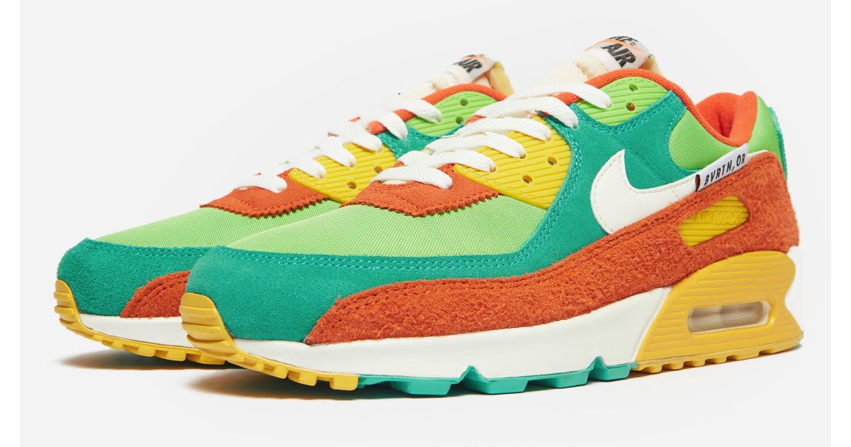 army green and orange air max