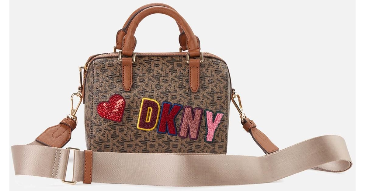 DKNY Bryant Park Logo Small Duffle Bag in Brown Lyst Canada