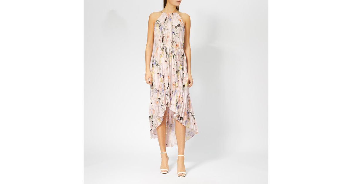 pleated dip hem dress