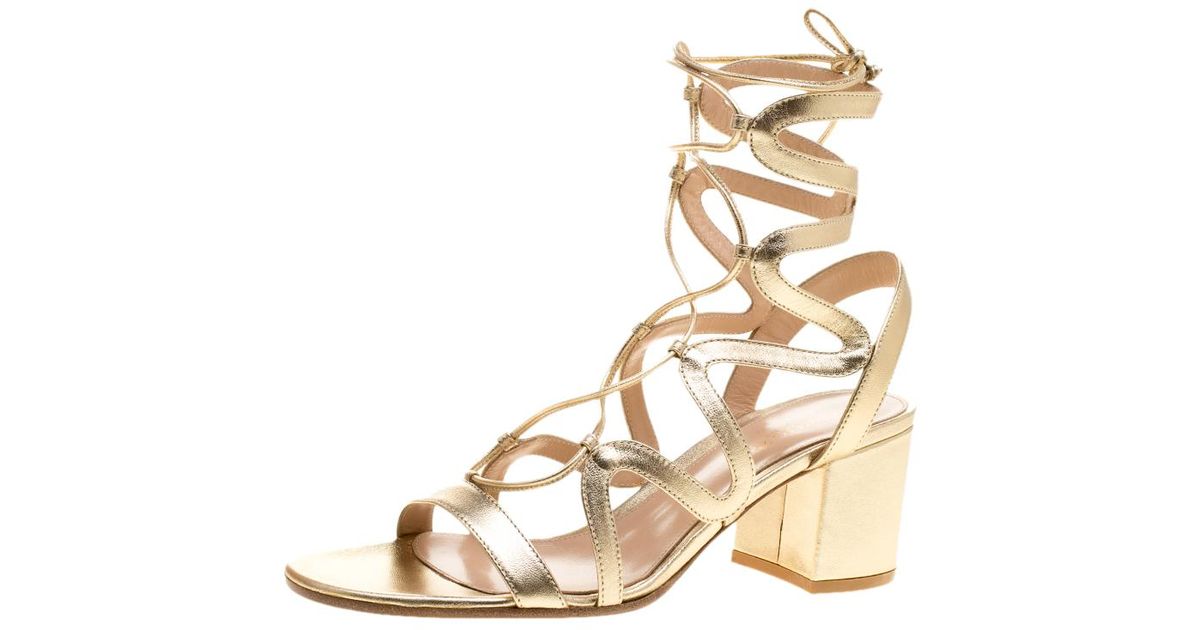 gold gladiator block heels