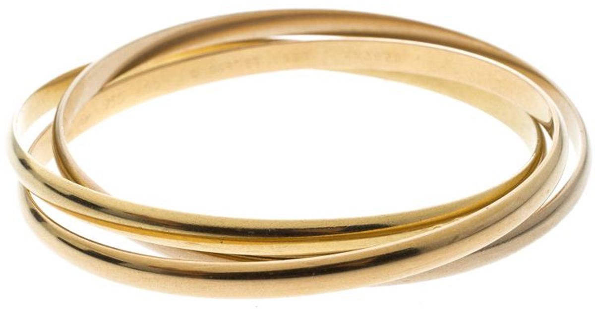 Cartier Trinity De 18k Three Tone Gold Rolling Bangle Bracelet In Cartier Trinity De 18k Three Tone Gold