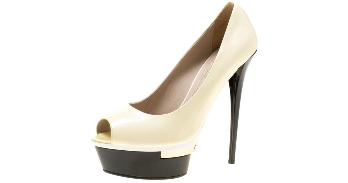 cream patent platform shoes