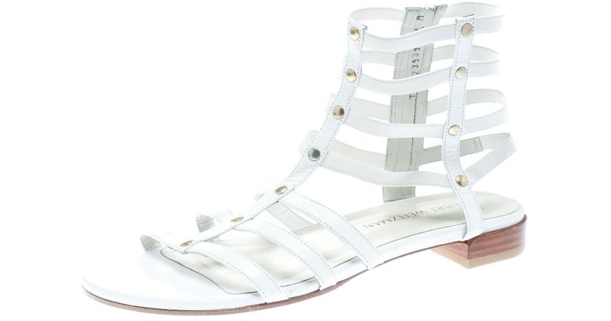 white flat gladiator sandals