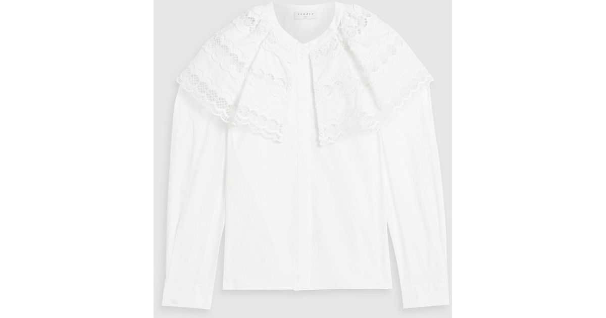 Sandro Ernesta Ruffled Broderie Anglaise Cotton Blouse in White | Lyst