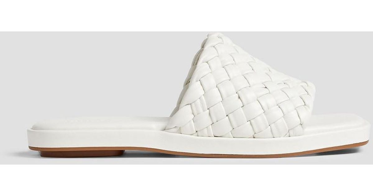 Vince Rumi Woven Leather Slides in White | Lyst