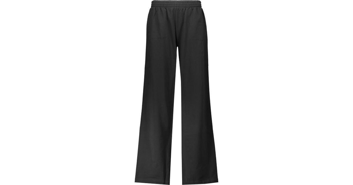 Norma Kamali Cotton-blend Wide-leg Track Pants in Black - Lyst