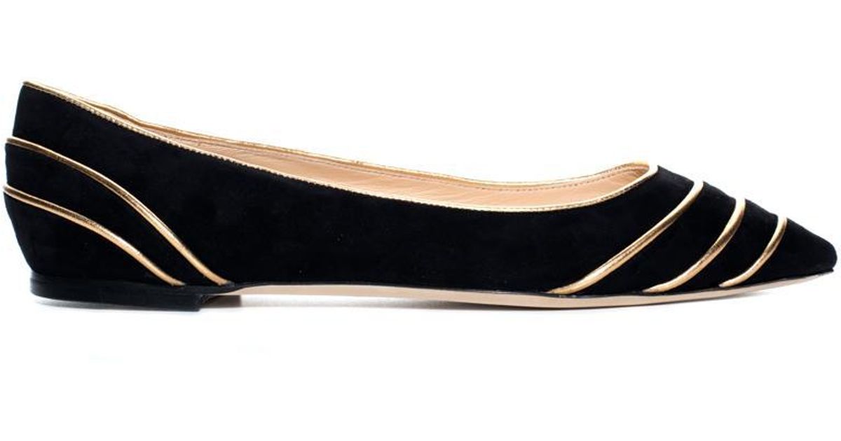 black flats with gold trim