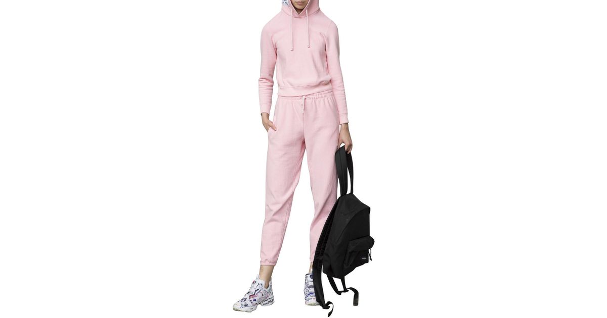 pink champion hoodie and sweatpants