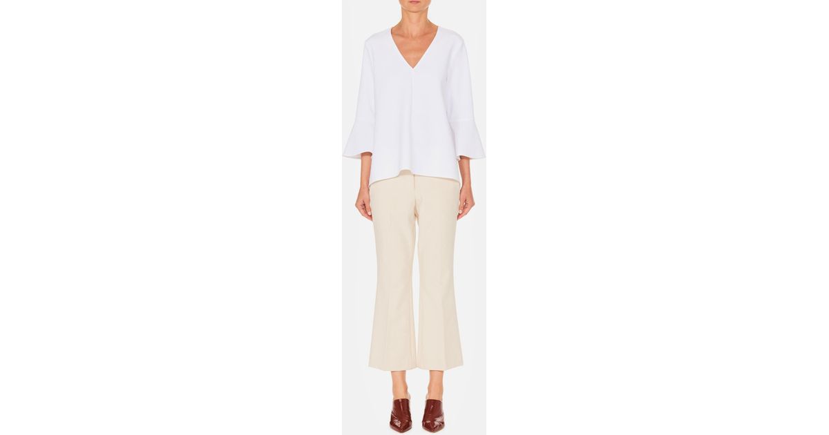tibi ruffle sleeve top