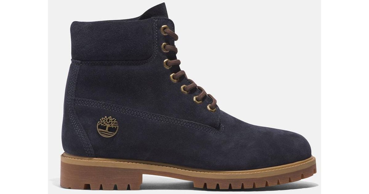 Blue and top gold timberlands