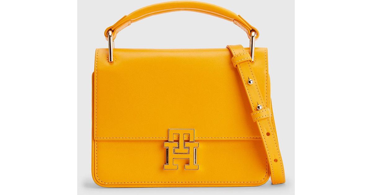Tommy Hilfiger Leather Push Lock Crossover Bag in Yellow Lyst UK
