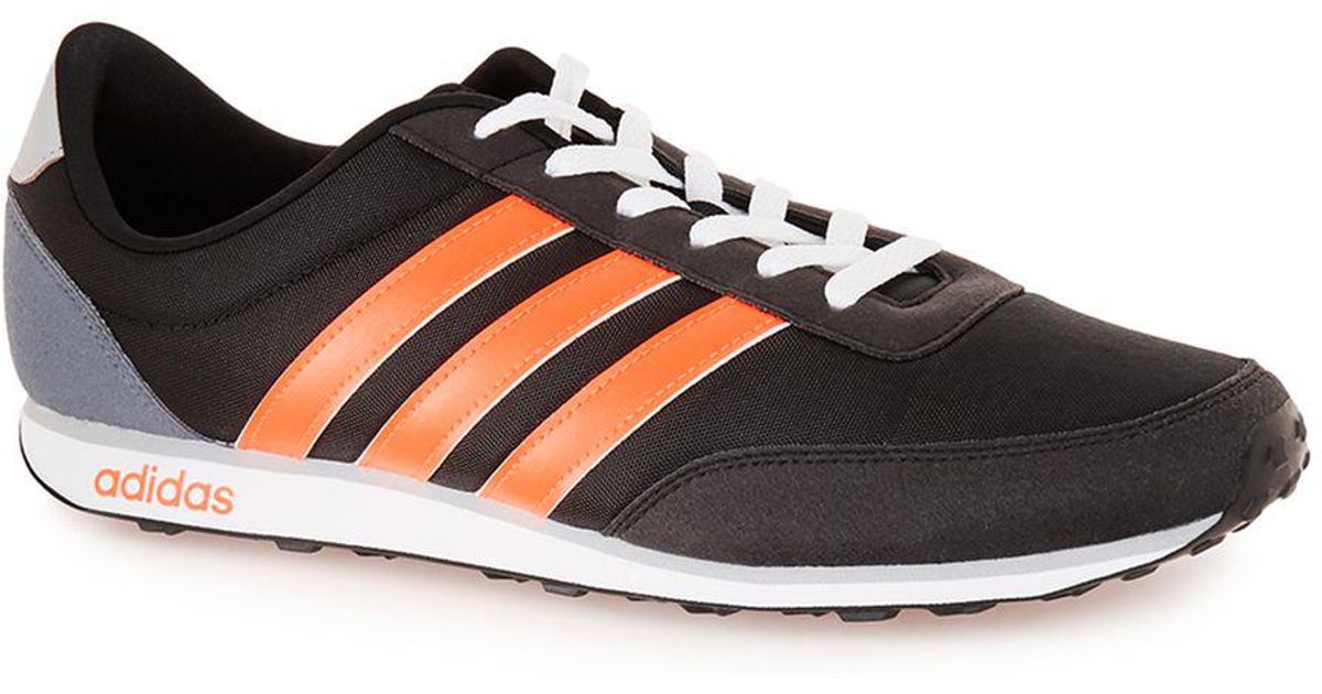 adidas shoes with orange stripes