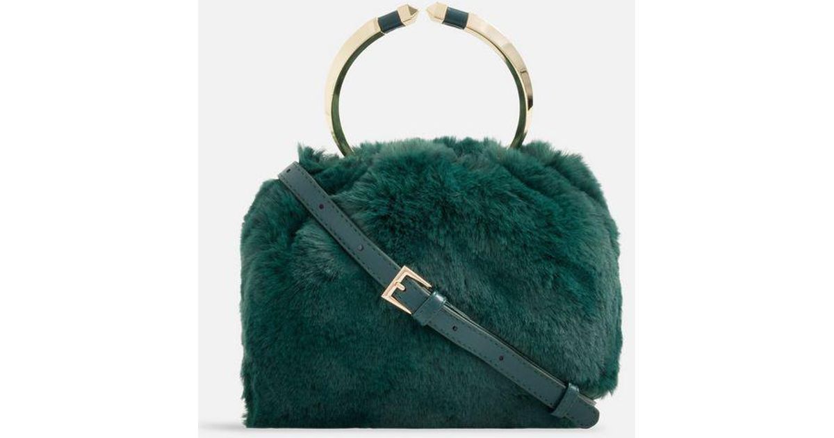 green faux fur bag