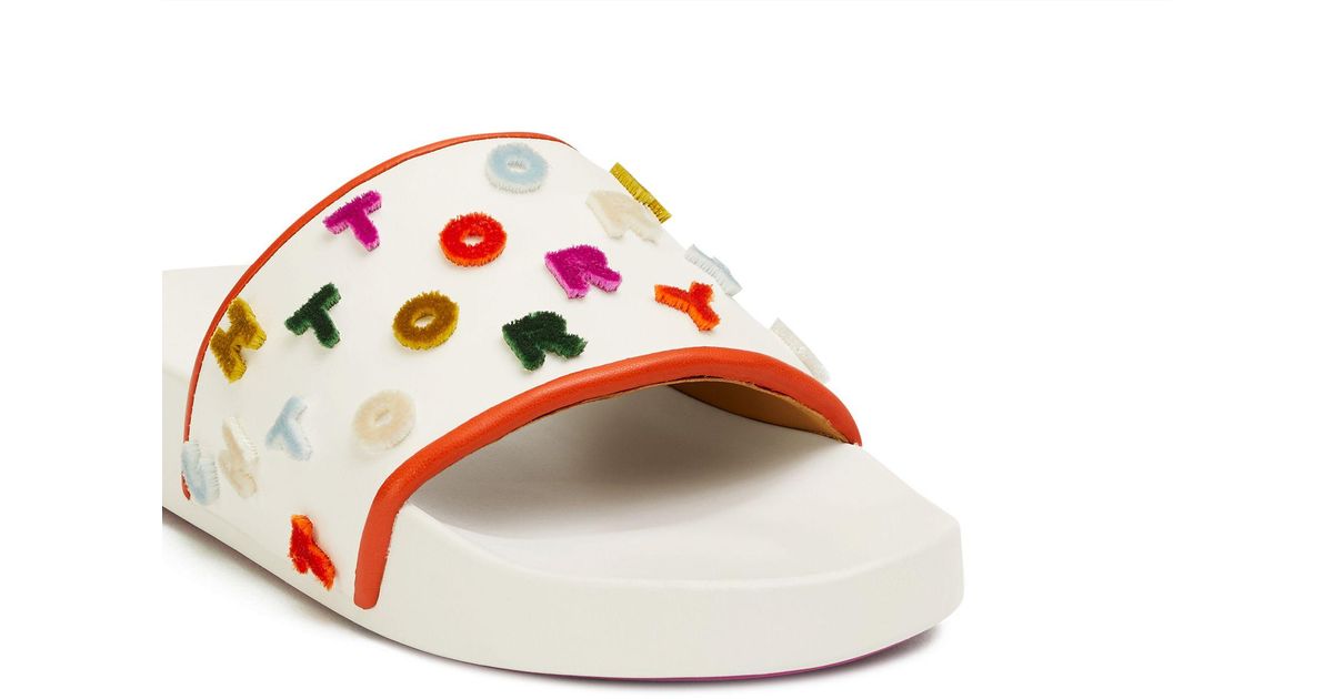 tory burch logo slides