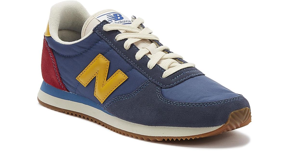 new balance navy & red 220 trainers