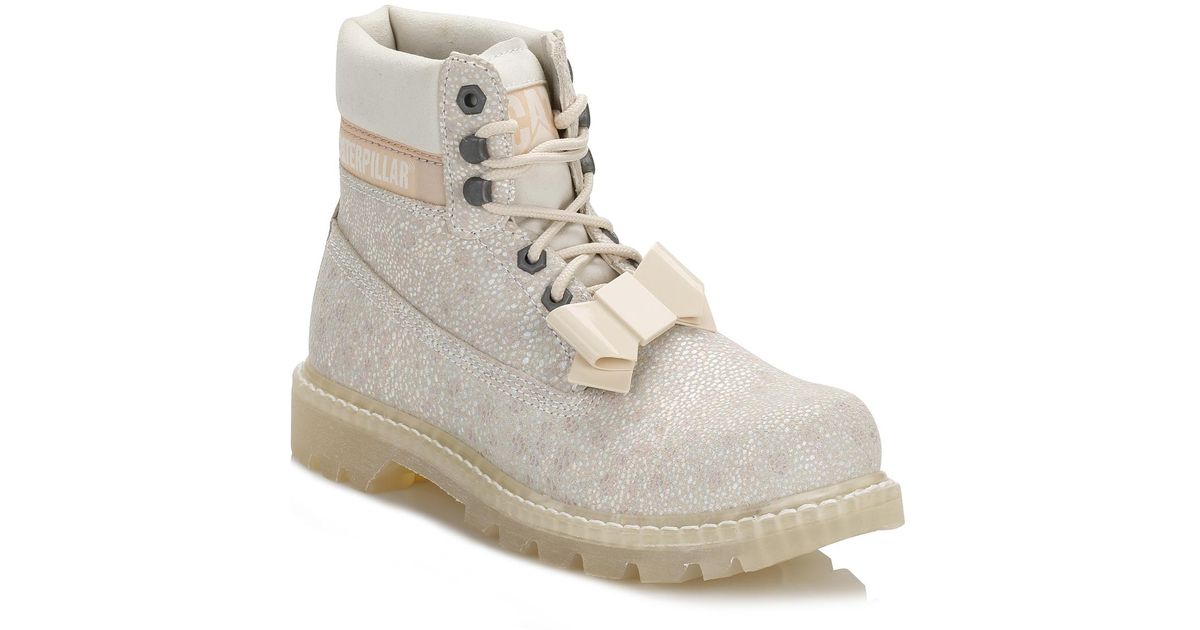 white caterpillar boots
