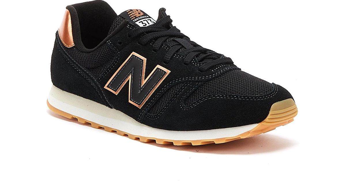 new balance 373 womens black and gold