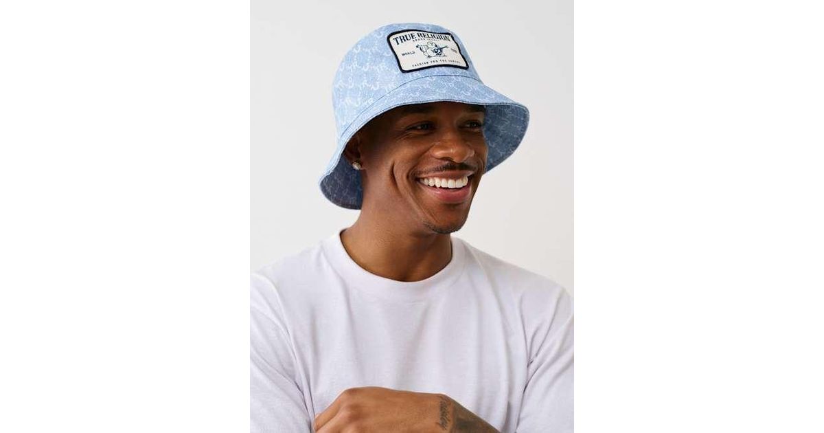 TRUE RELIGION Monogram Bucket Hat in White | Lyst